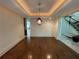 Elegant dining room with hardwood floors and a statement light fixture at 4070 Annecy Sw Dr, Atlanta, GA 30331