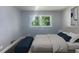 Spacious bedroom with a comfortable bed and large windows at 2492 Brentwood Ct, Decatur, GA 30032