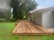 Wooden deck overlooks backyard and green space at 2492 Brentwood Ct, Decatur, GA 30032