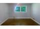 Bright bedroom with hardwood floors and large windows at 2492 Brentwood Ct, Decatur, GA 30032
