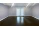 Bright living room featuring hardwood floors and French doors at 2492 Brentwood Ct, Decatur, GA 30032
