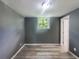 Finished basement room with gray walls and vinyl flooring at 2492 Brentwood Ct, Decatur, GA 30032