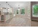 Breakfast nook with tile flooring and view of backyard at 6925 Keswick Ct, Cumming, GA 30040