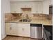 Modern kitchen with granite countertops and stainless steel appliances at 2416 Peachwood Ne Cir # 9, Atlanta, GA 30345