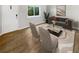 Virtually staged living room with light flooring and modern furniture at 2416 Peachwood Ne Cir # 9, Atlanta, GA 30345