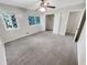 Bedroom with gray carpeting and a ceiling fan at 2416 Peachwood Ne Cir # 9, Atlanta, GA 30345