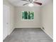 Well-lit bedroom with carpet and a ceiling fan at 2416 Peachwood Ne Cir # 9, Atlanta, GA 30345