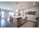 Modern kitchen features a large island, stainless steel appliances, and an open layout at 1725 Prospect Way, Conyers, GA 30094