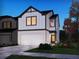 Two-story house with white and black exterior at 1600 Flint River Place Se Se Pl, Smyrna, GA 30126