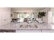 Kitchen island with double sink overlooks the living and dining areas at 1600 Flint River Place Se Se Pl, Smyrna, GA 30126