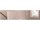 Upstairs hallway with carpet and doors to bedrooms at 1600 Flint River Place Se Se Pl, Smyrna, GA 30126