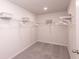 Spacious walk-in closet with wire shelving and hanging rods at 1600 Flint River Place Se Se Pl, Smyrna, GA 30126