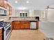 Open kitchen with granite countertops and stainless steel appliances at 4206 Weavers White Ln # 17, Austell, GA 30106
