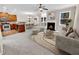 Open concept living room with kitchen, fireplace, and dining area at 4206 Weavers White Ln # 17, Austell, GA 30106