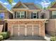 Stunning two-story home with stone accents and a three-car garage at 4206 Weavers White Ln # 17, Austell, GA 30106