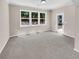 Cozy bedroom with neutral walls and carpet flooring and backyard access at 4206 Weavers White Ln # 17, Austell, GA 30106