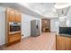 Kitchen with stainless steel appliances and wood cabinets at 1112 Delaware Se Ave, Atlanta, GA 30316