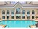 Resort-style pool with building access and plenty of space for relaxation at 3334 Peachtree Ne Rd # 704, Atlanta, GA 30326