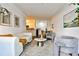 Open concept living room flows into kitchen and dining areas, featuring hardwood floors at 3334 Peachtree Ne Rd # 704, Atlanta, GA 30326