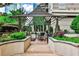 Outdoor grilling area with pergola and seating for dining al fresco at 3334 Peachtree Ne Rd # 704, Atlanta, GA 30326