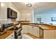 Updated kitchen with stainless steel appliances and granite countertops at 3334 Peachtree Ne Rd # 704, Atlanta, GA 30326