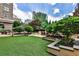 Landscaped courtyard with artificial turf and seating areas at 3334 Peachtree Ne Rd # 704, Atlanta, GA 30326