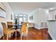 Elegant dining area with hardwood floors and stylish modern chairs at 3334 Peachtree Ne Rd # 704, Atlanta, GA 30326