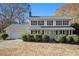 Two-story house with a gray roof, white siding, and landscaping at 201 Vistawood Ln, Marietta, GA 30066