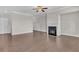 Living room with hardwood floors and fireplace at 1610 Habersham Villa Dr, Cumming, GA 30041