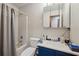 Clean bathroom with blue vanity and shower/tub combo at , Hiram, GA 30141