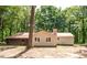 Back exterior view of house, featuring a metal roof at 146 Mount Bethel Rd, Mcdonough, GA 30252