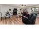 Living room with hardwood floors, fireplace, and comfortable seating at 146 Mount Bethel Rd, Mcdonough, GA 30252