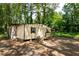 Small guest house or workshop with a covered porch at 146 Mount Bethel Rd, Mcdonough, GA 30252
