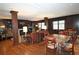 Spacious common room with a fireplace, comfortable seating, and bookcases at 1735 Peachtree Ne St # 210, Atlanta, GA 30309