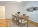 Formal dining room with hardwood floors and wood dining set at 1735 Peachtree Ne St # 210, Atlanta, GA 30309