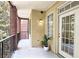 Private balcony with brick and neutral colored walls at 1735 Peachtree Ne St # 210, Atlanta, GA 30309