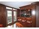 Built-in wet bar with cabinets, countertop and bar stools at 1735 Peachtree Ne St # 210, Atlanta, GA 30309