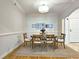 Formal dining room featuring hardwood floors and an oval table at 1735 Peachtree Ne St # 210, Atlanta, GA 30309