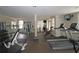 Well-equipped fitness center with treadmills, weights, and other exercise machines at 1735 Peachtree Ne St # 210, Atlanta, GA 30309