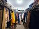 Large walk-in closet with ample shelving and hanging space for clothes and accessories at 1735 Peachtree Ne St # 210, Atlanta, GA 30309