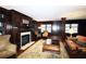 Common room with fireplace, seating area, and built-in bookcases at 1735 Peachtree Ne St # 210, Atlanta, GA 30309
