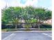 Landscaped courtyard with trees, seating areas and a pergola at 1735 Peachtree Ne St # 210, Atlanta, GA 30309