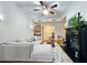 Living room featuring hardwood floors, sectional sofa, and fireplace at 1735 Peachtree Ne St # 210, Atlanta, GA 30309