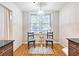 Bright breakfast nook with two chairs and a small table, perfect for enjoying morning coffee at 1735 Peachtree Ne St # 210, Atlanta, GA 30309