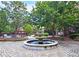 Peaceful courtyard featuring a central fountain and ample seating at 1735 Peachtree Ne St # 210, Atlanta, GA 30309
