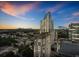 Aerial view of building at sunset with city skyline in background at 3324 Peachtree Ne Rd # 2718, Atlanta, GA 30326