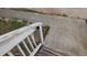 Exterior stairs with weathered white railing and damaged wood at 2159 Martin Luther King, Jr. Dr, Atlanta, GA 30310