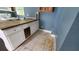 Kitchen with white cabinets and wood countertop at 2159 Martin Luther King, Jr. Dr, Atlanta, GA 30310