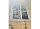 Damaged window with broken glass and weathered frame at 2159 Martin Luther King, Jr. Dr, Atlanta, GA 30310