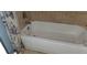 A white bathtub with tiled surround at 2159 Martin Luther King, Jr. Dr, Atlanta, GA 30310